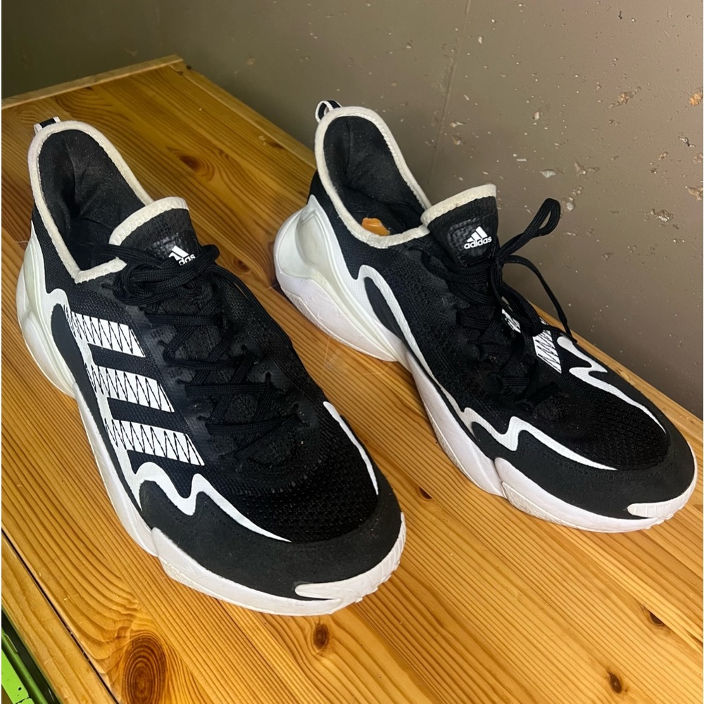 Adidas shoe Black with white accents. Size 15